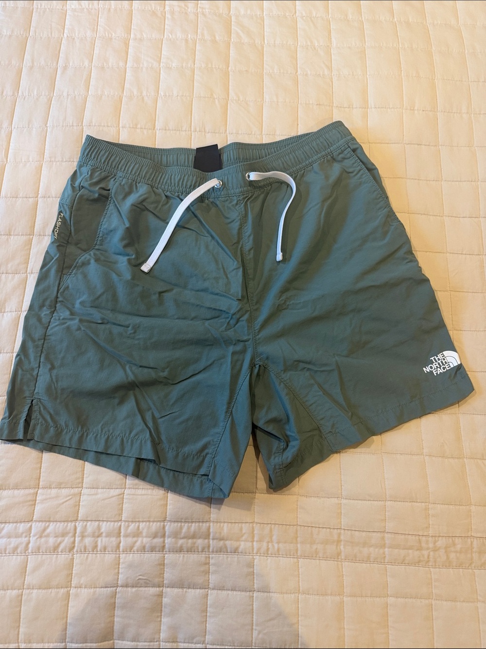 The North Face Men's Athletic Shorts in Green with White Drawstring